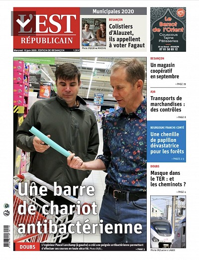 French Newspaper article June 2020 with engineer and his antibacterial plastic tube for caddy handle in supermarket